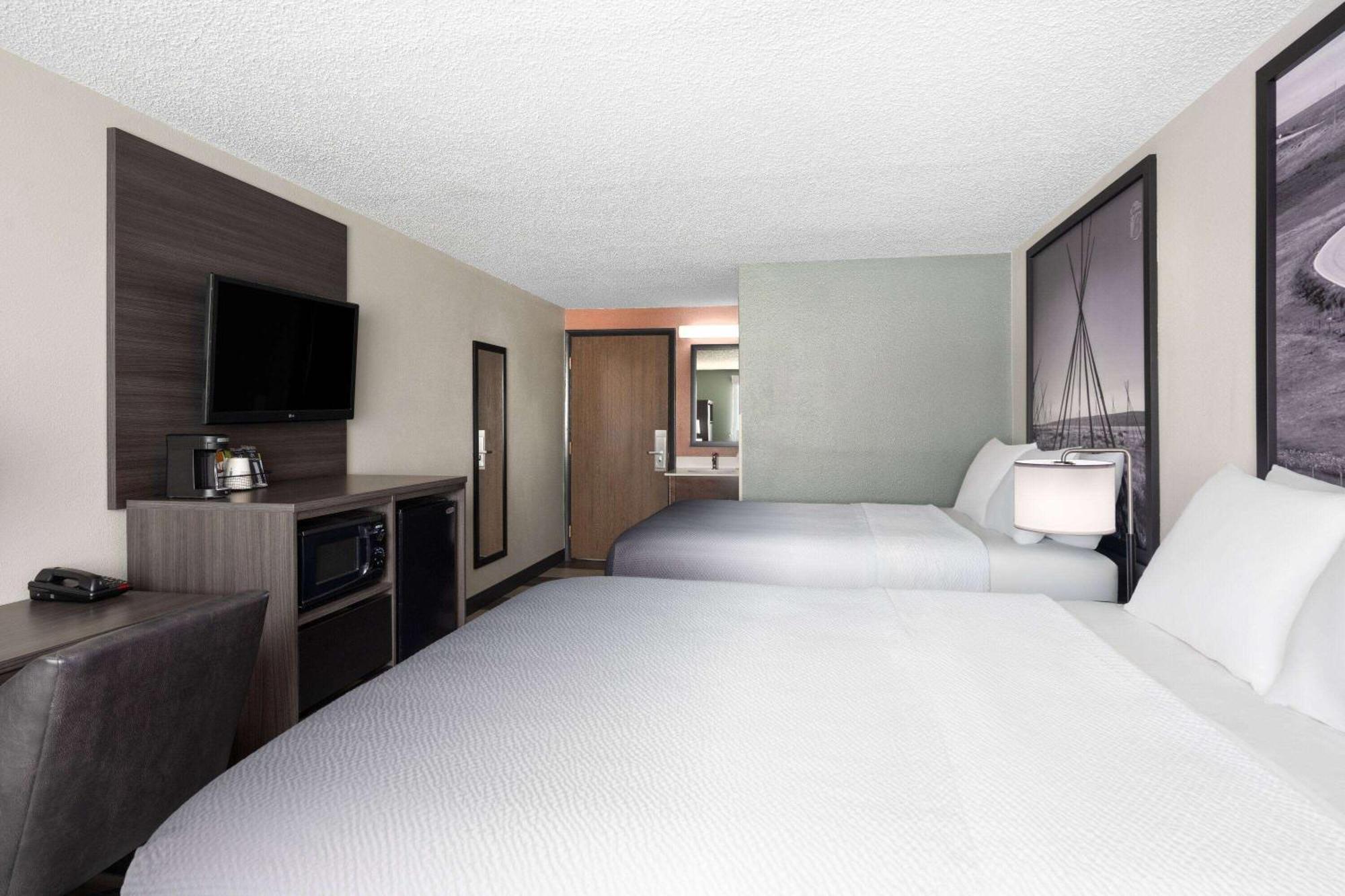 Hotel Super 8 By Wyndham Conrad Extérieur photo